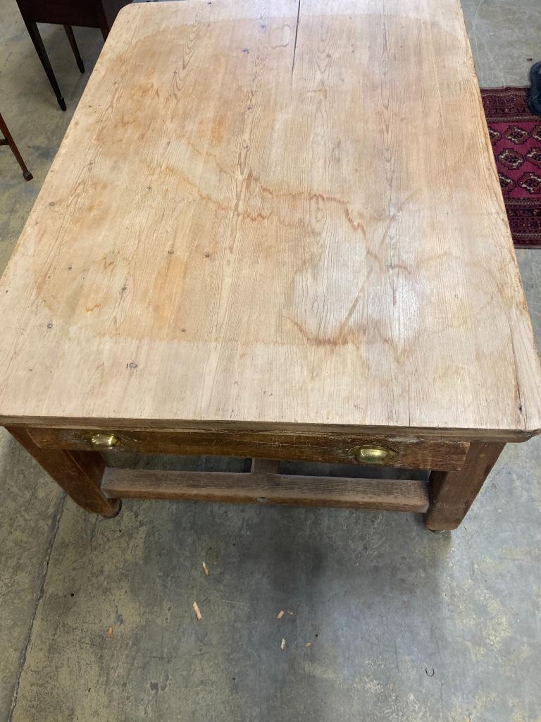 A large Victorian pine kitchen table